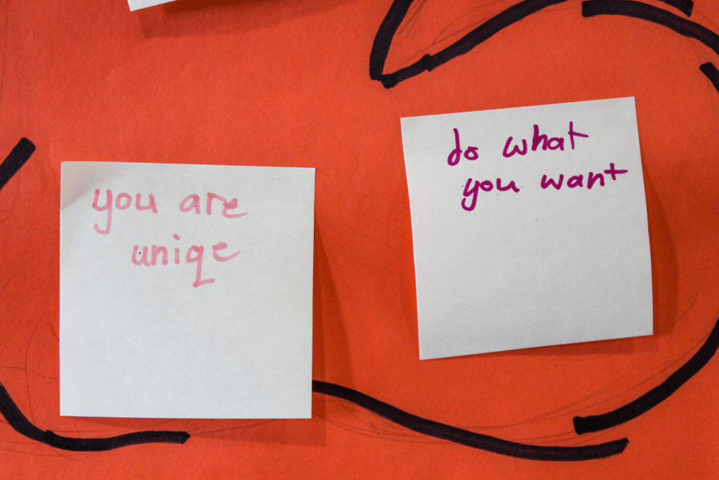 Encouraging notes written by Guadalupe School students saying, "You are unique" and "Do what you want."